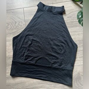 Demeanor cropped halter top with keyhole detail. Size m